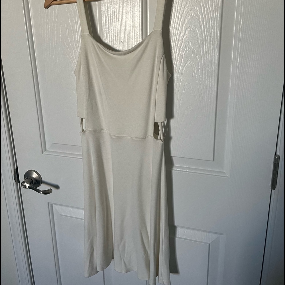 Offwhite color dress with side cut outs